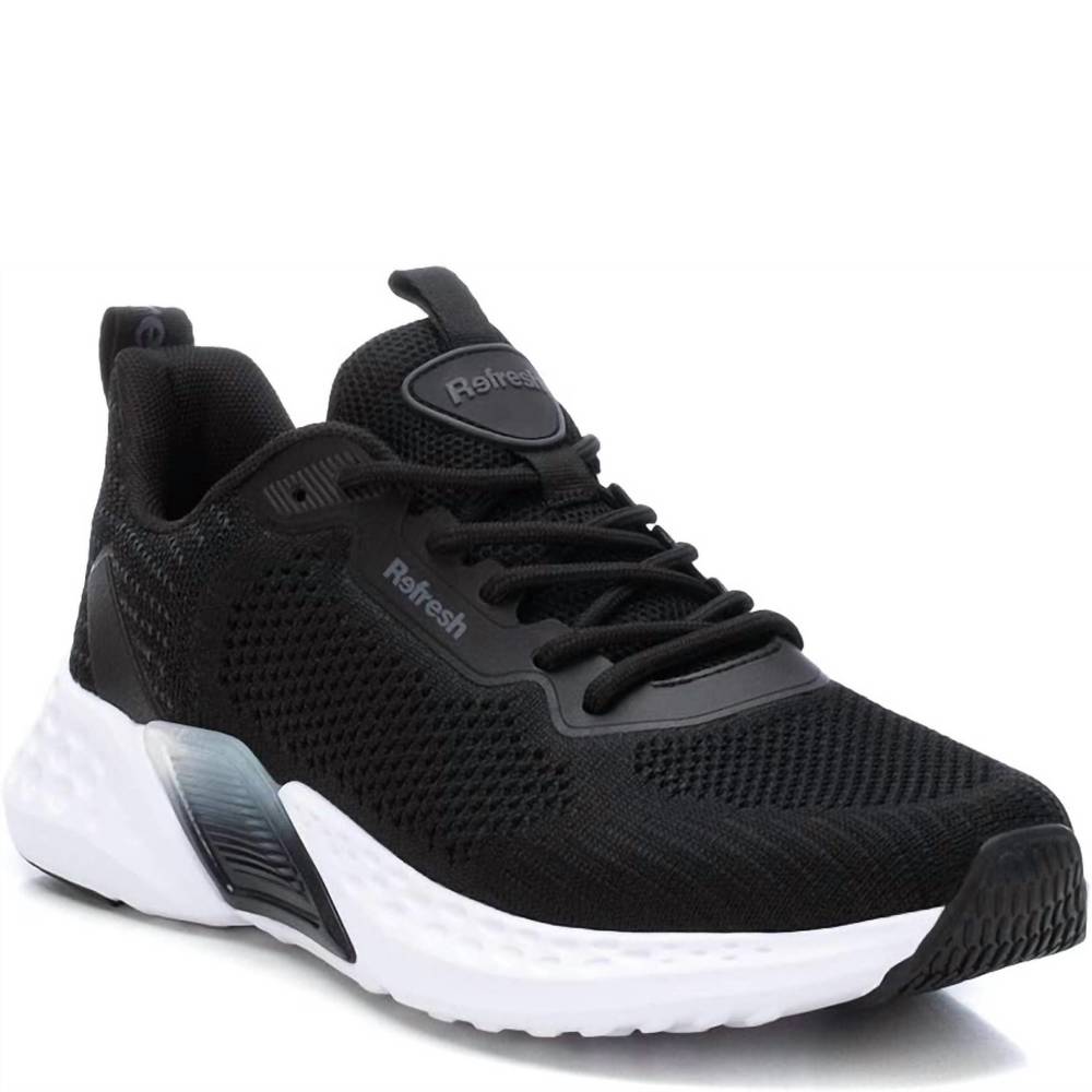 NEW XTI women's sneakers in black